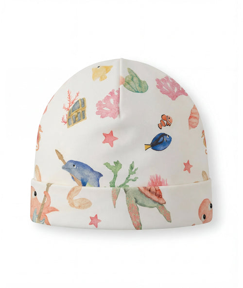 Children's beanie with ocean-themed pattern on a white background