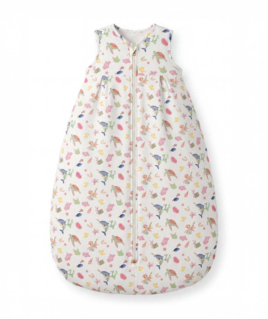 Children's sleeping bag with colorful animal pattern on a white background