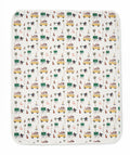 Patterned blanket with vehicles and nature elements on a white background