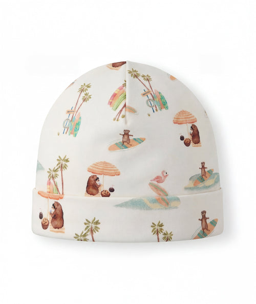 Baby hat with beach-themed pattern on a white background
