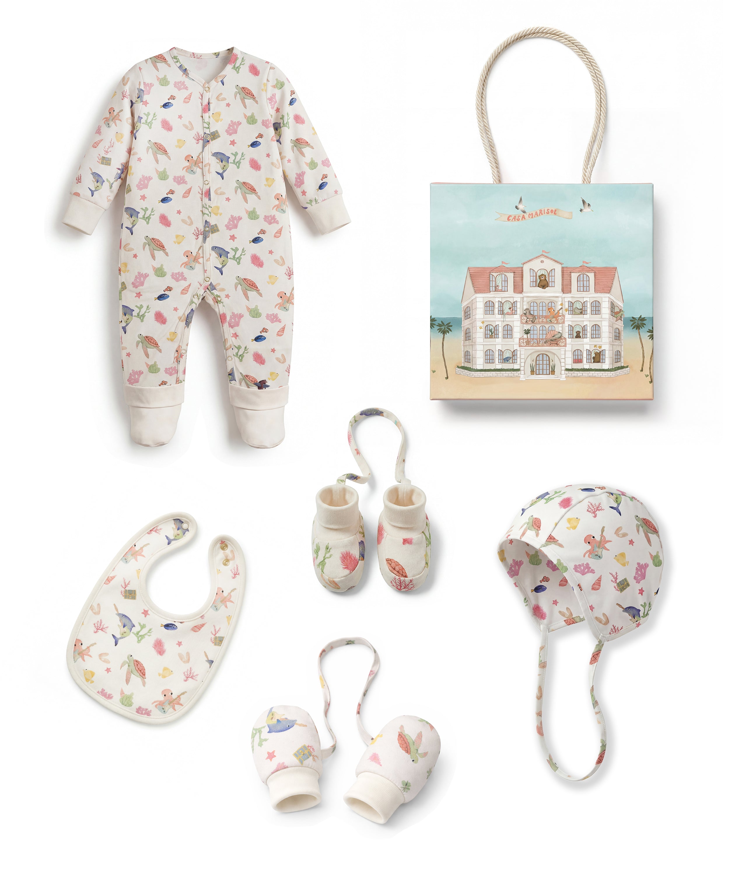 Baby clothing and accessories set with floral patterns on a white background